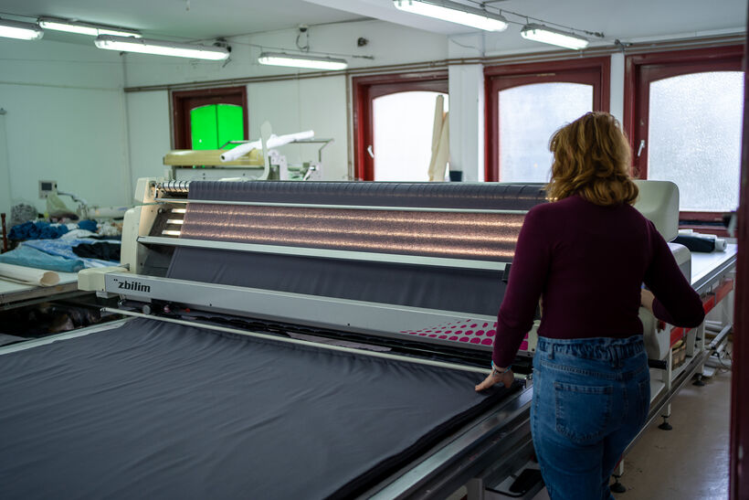 Fabric spreading